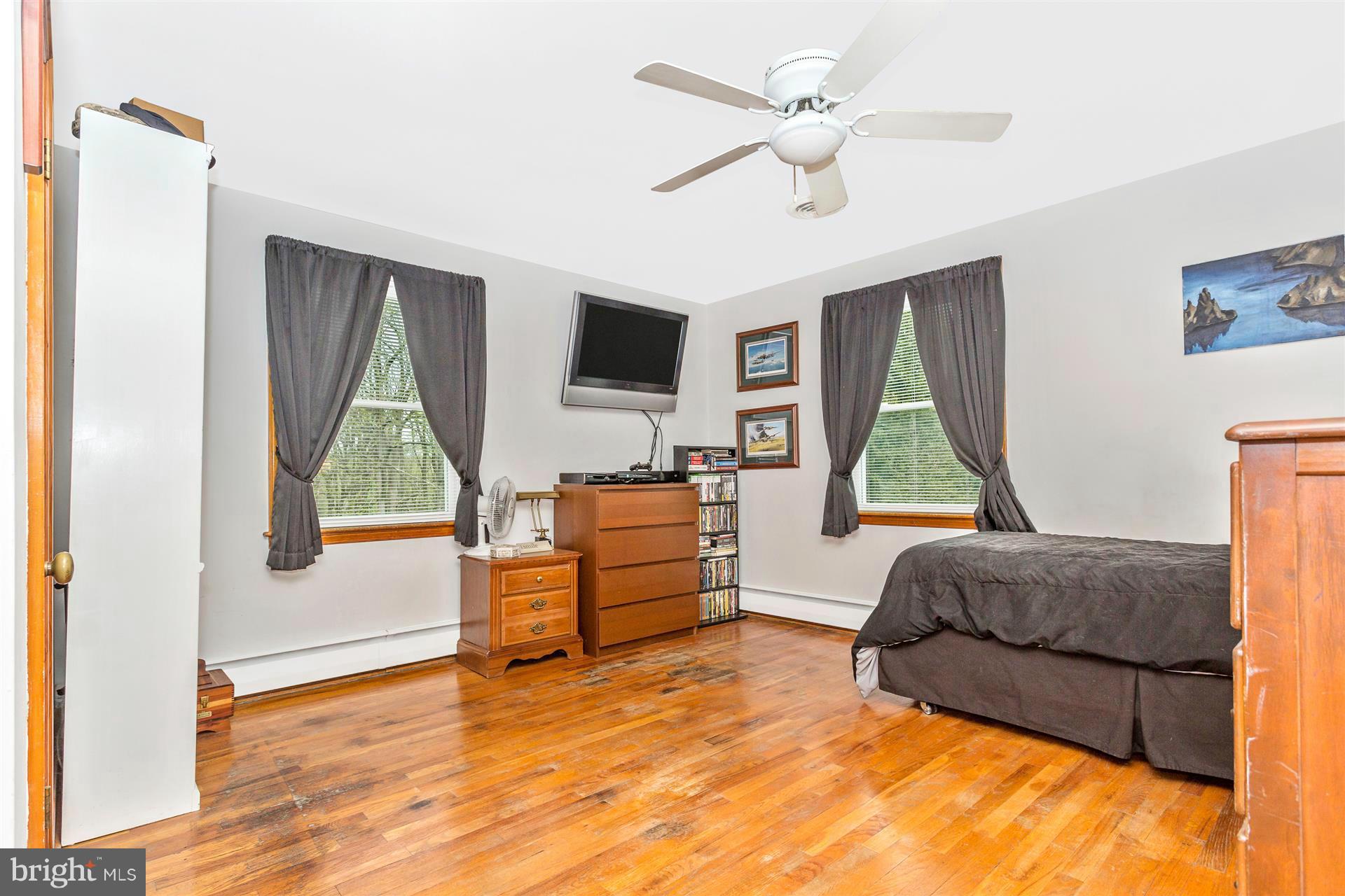 4834 Old Swimming Pool Road Frederick, MD 21703 - Photo 12 of 27 a living room with furniture and a window