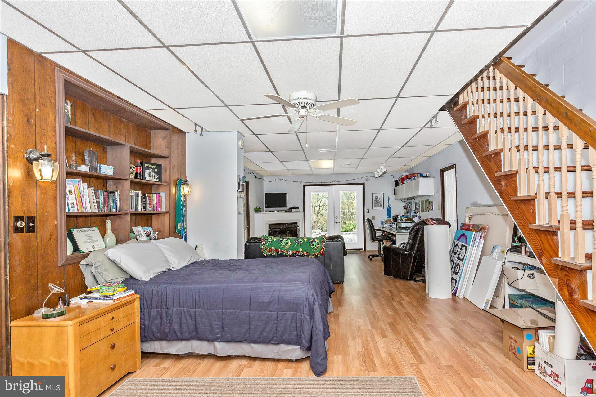 4834 Old Swimming Pool Road Frederick, MD 21703 - Photo 15 of 27 a living room with furniture and a wooden floor