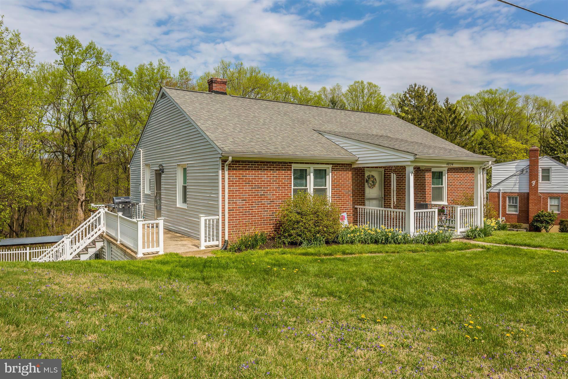 4834 Old Swimming Pool Road Frederick, MD 21703 - Photo 26 of 27 a view of a house with a yard and sitting area