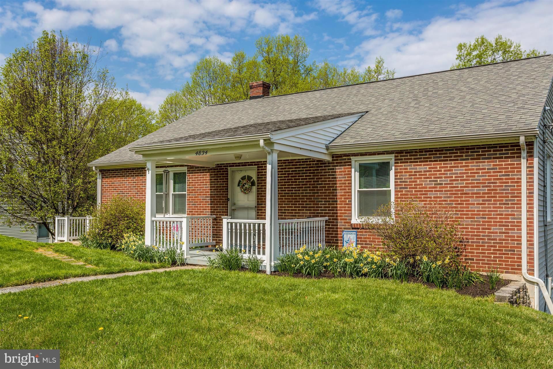4834 Old Swimming Pool Road Frederick, MD 21703 - Photo 27 of 27 a front view of a house with a yard