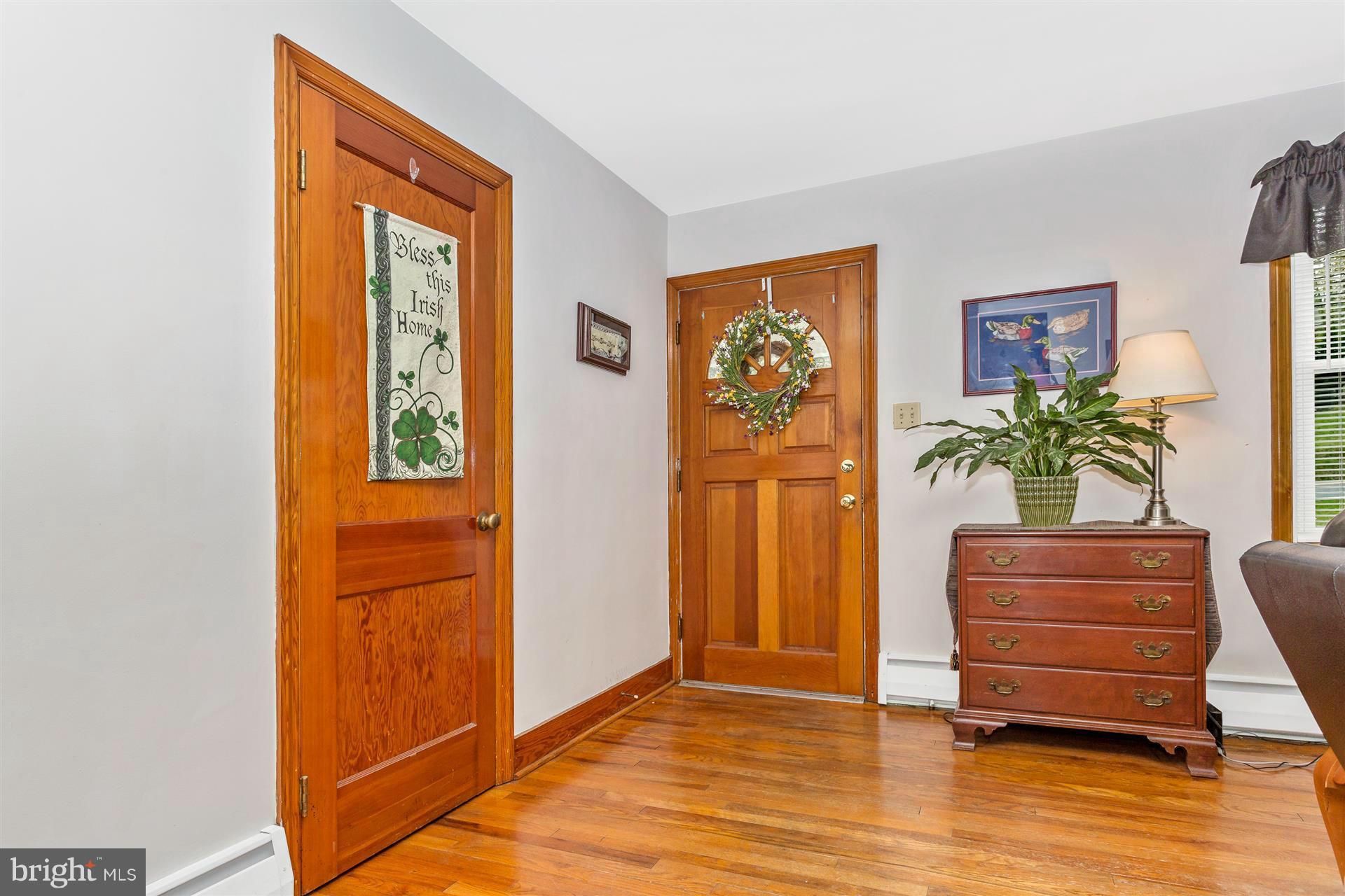 4834 Old Swimming Pool Road Frederick, MD 21703 - Photo 9 of 27 a view of room with furniture and a potted plant