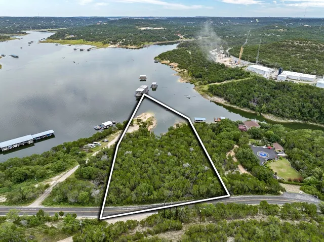 a view of a balcony with ocean view