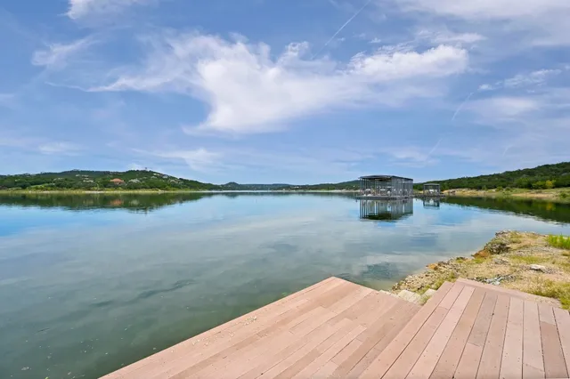 a view of a lake with a big yard