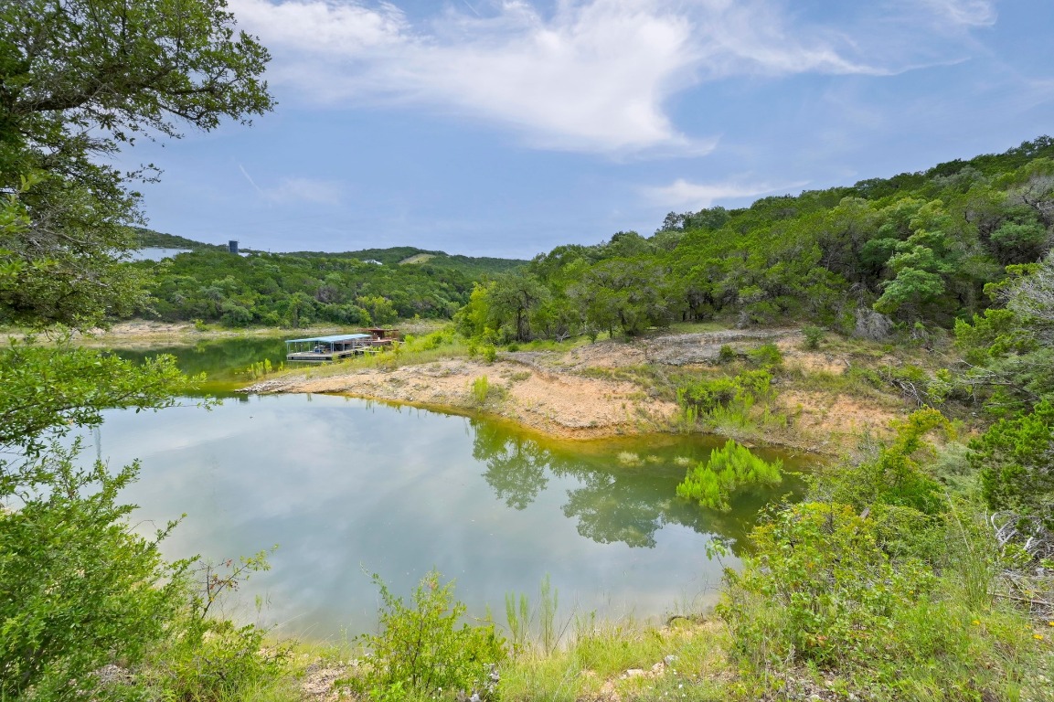 9006 Lime Creek Road Leander, TX 78641 - Photo 5 of 18 a view of a lake with a houses