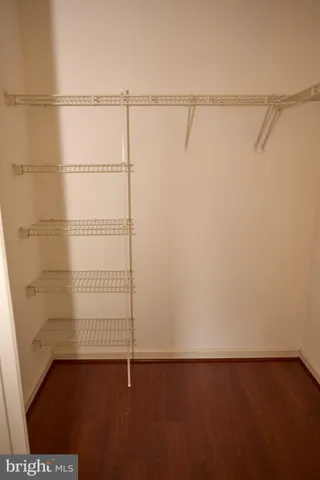 a view of a room with racks on the wall