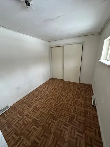 a bedroom with a bed