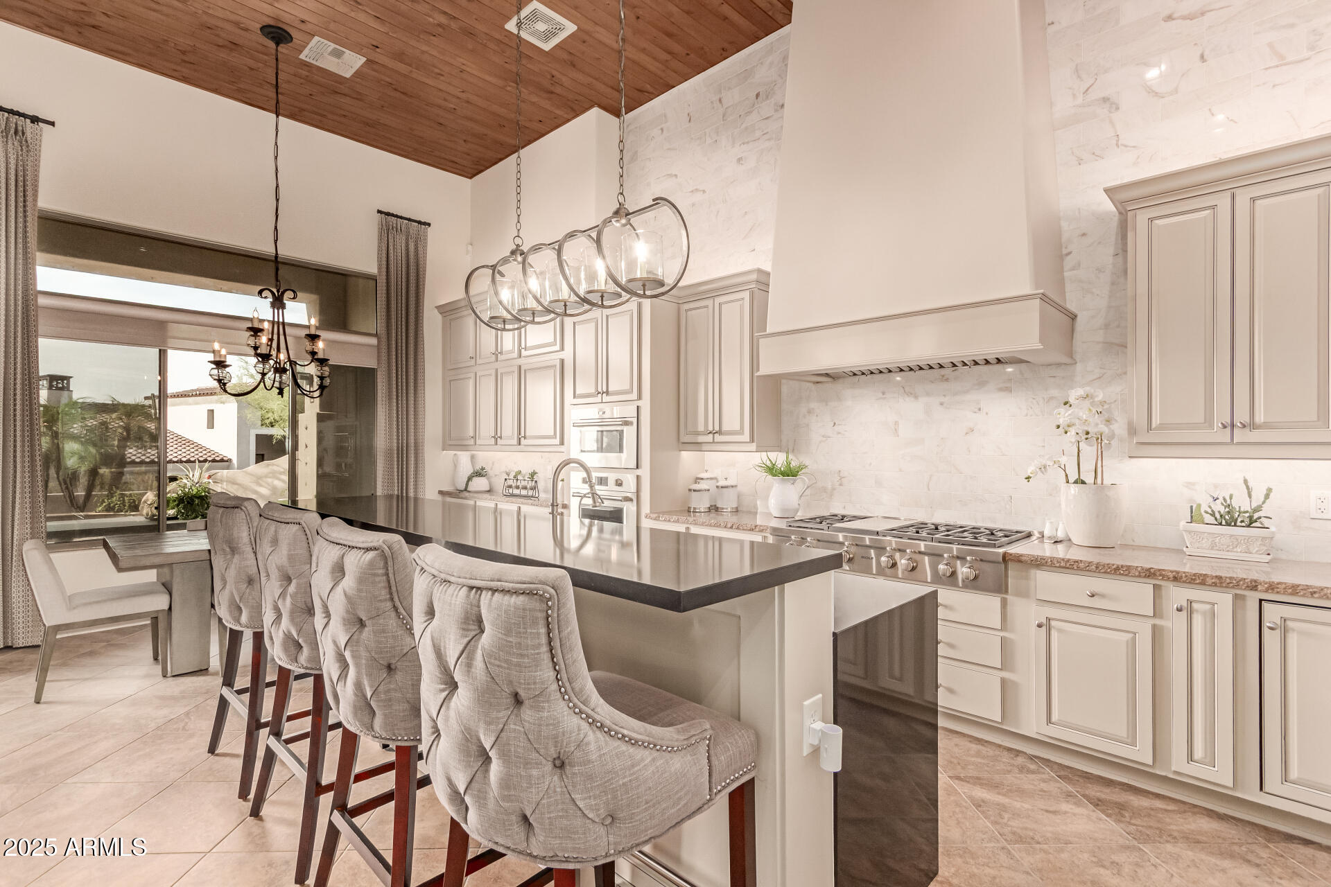 4317 North Brighton Circle Mesa, AZ 85207 - Photo 15 of 76 a kitchen with stainless steel appliances granite countertop a sink and cabinets
