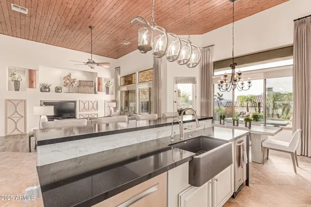 a room with furniture a rug and a window