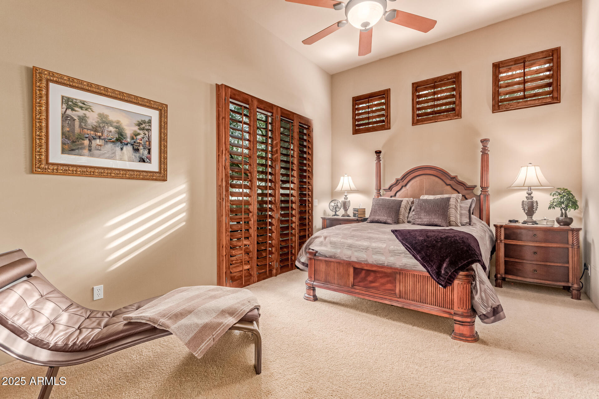 4317 North Brighton Circle Mesa, AZ 85207 - Photo 29 of 76 a bedroom with a bed and a chandelier