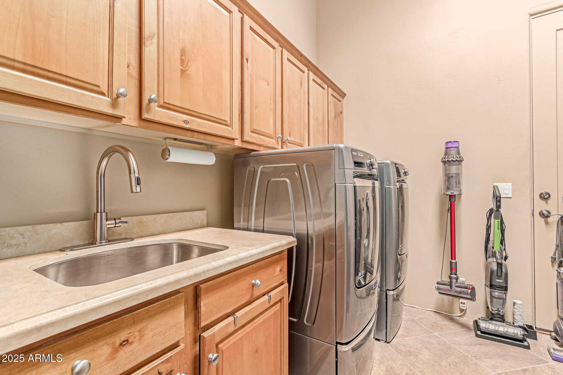 4317 North Brighton Circle Mesa, AZ 85207 - Photo 46 of 76 a kitchen with stainless steel appliances granite countertop a sink and refrigerator