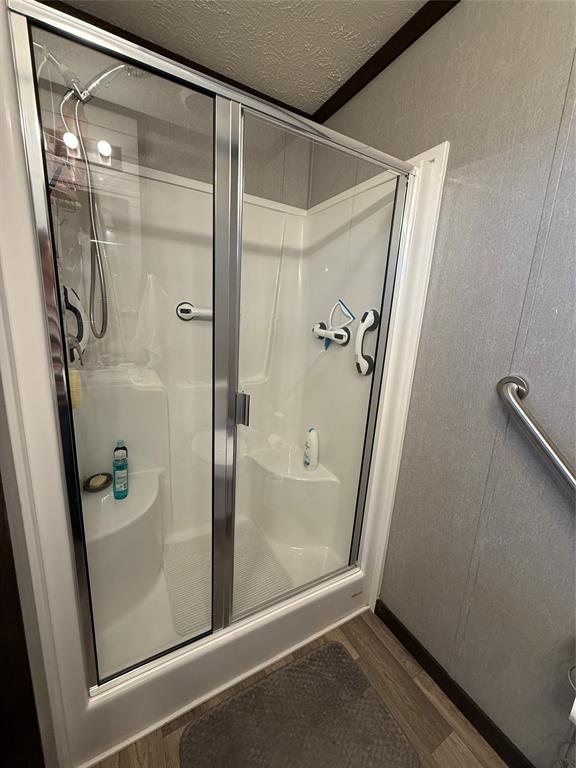 12703 Farm To Market 59 Athens, TX 75751 - Photo 33 of 40 a bathroom with a glass shower door