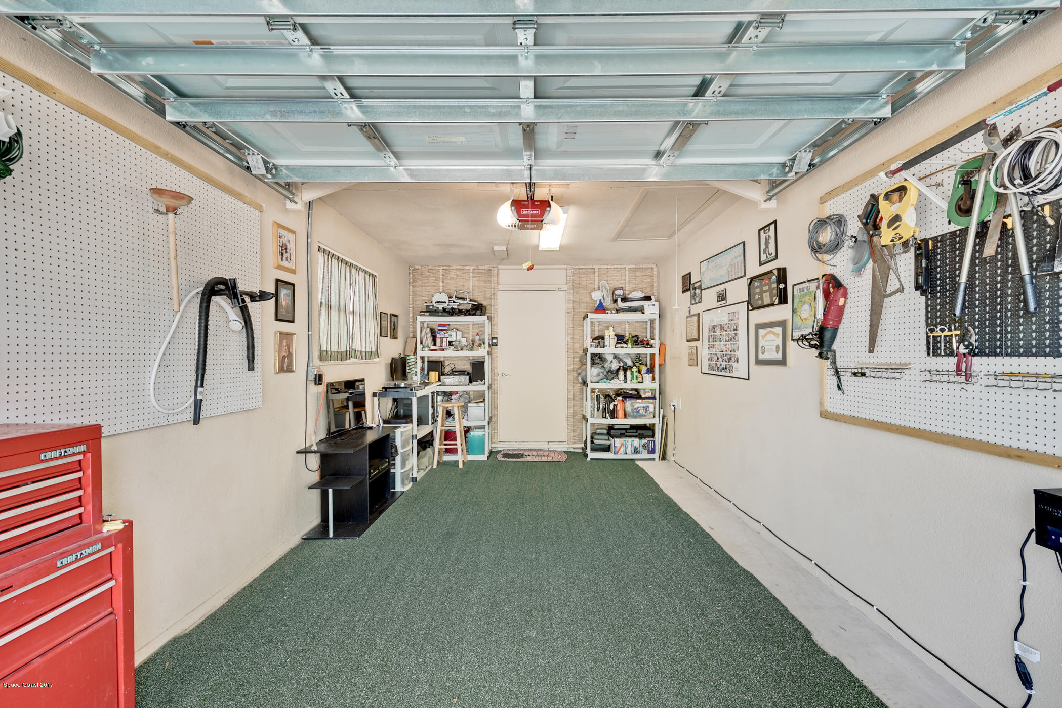 4241 Wellington Road Melbourne, FL 32935 - Photo 14 of 14 One-Car Garage- New Garage Door