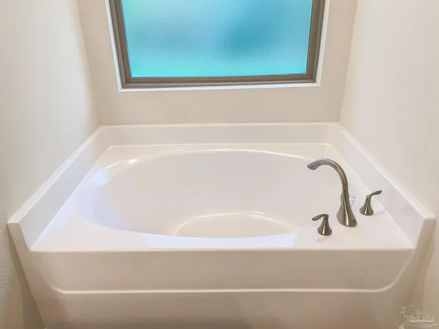 a bathroom with a bathtub
