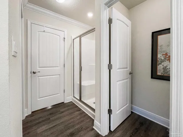 a view of entryway with wooden floor