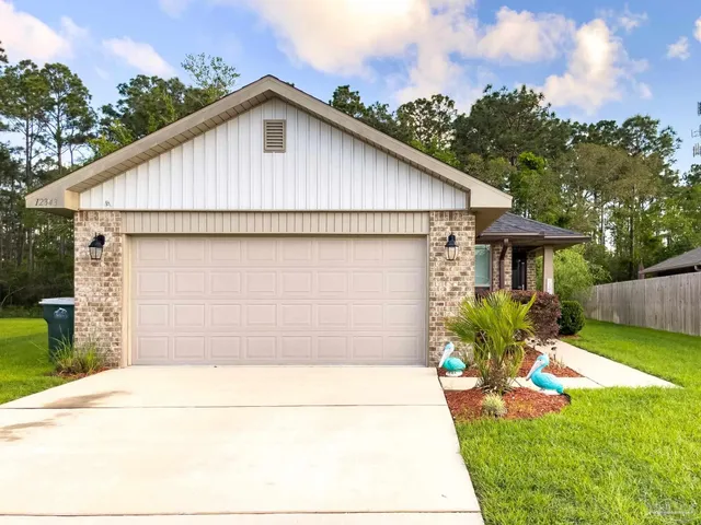 a front view of house with yard
