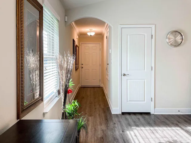 a view of entryway with wooden floor
