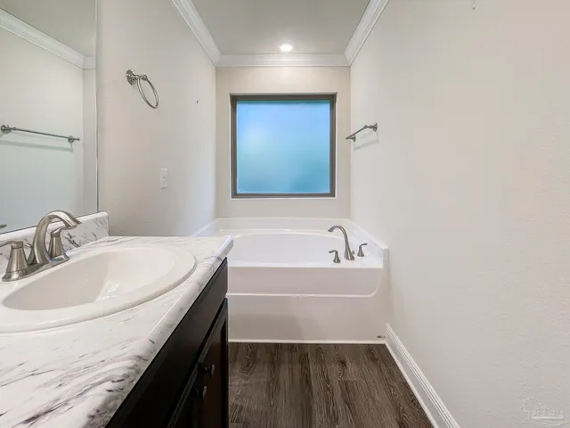 a bathroom with a sink and a bathtub
