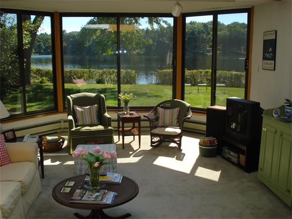 10 Pickerel Road Wellesley, MA 01760 - Photo 11 of 22 a living room with furniture and a floor to ceiling window