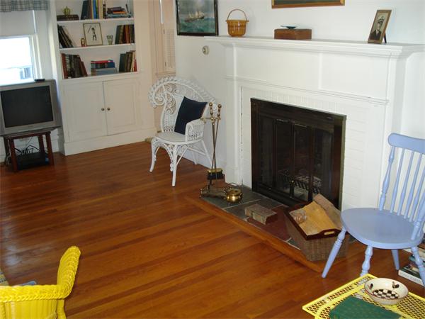 10 Pickerel Road Wellesley, MA 01760 - Photo 17 of 22 a living room with furniture and a fireplace