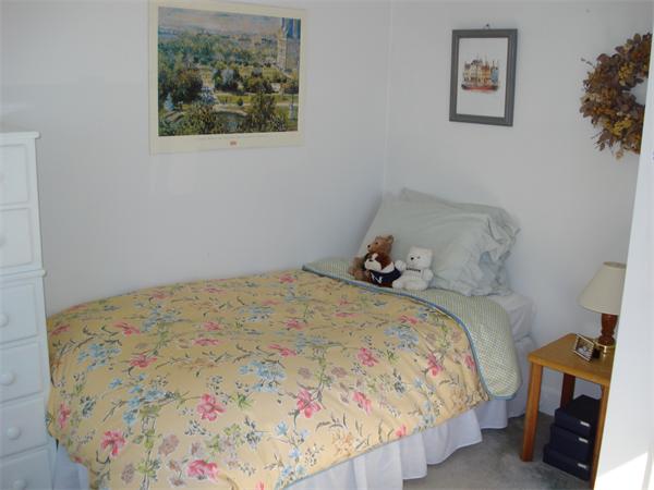 10 Pickerel Road Wellesley, MA 01760 - Photo 19 of 22 a bedroom with a bed and a couch