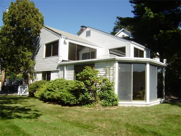 10 Pickerel Road Wellesley, MA 01760 - Photo 20 of 22 a front view of a house with a yard