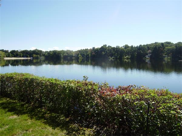 10 Pickerel Road Wellesley, MA 01760 - Photo 5 of 22 a view of a lake with a mountain in the background