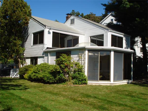 10 Pickerel Road Wellesley, MA 01760 - Photo 6 of 22 a front view of a house with a yard