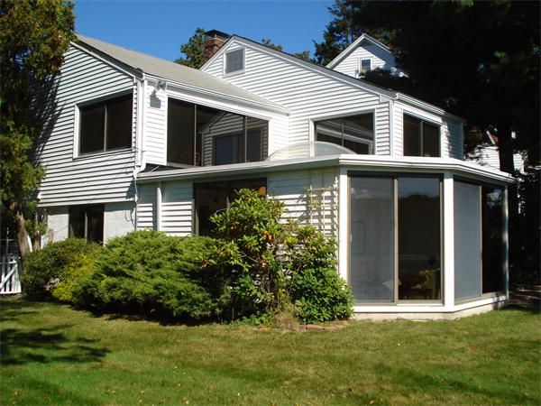 10 Pickerel Road Wellesley, MA 01760 - Photo 10 of 22 a view of a white house with a yard