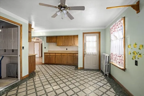 a kitchen with a refrigerator a sink and dishwasher