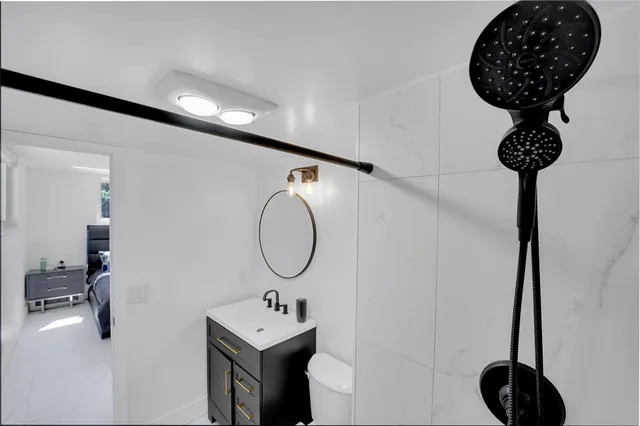 a room with a table and a chandelier