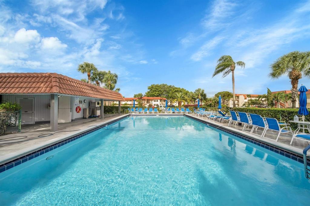 8911 South Hollybrook Boulevard, Unit 201 Pembroke Pines, FL 33025 - Photo 28 of 31 a view of a house with swimming pool yard and outdoor seating