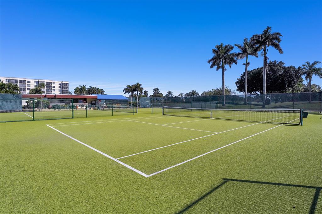 8911 South Hollybrook Boulevard, Unit 201 Pembroke Pines, FL 33025 - Photo 29 of 31 a view of a tennis court