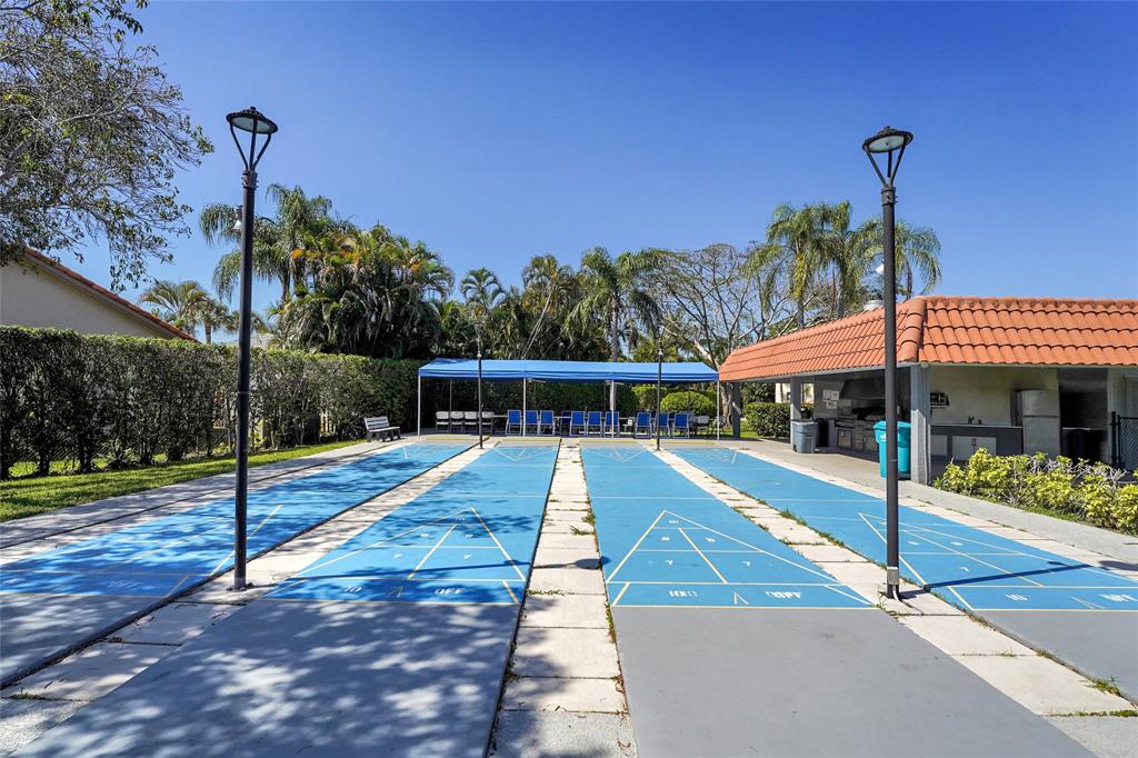 8911 South Hollybrook Boulevard, Unit 201 Pembroke Pines, FL 33025 - Photo 31 of 31 a view of a swimming pool with a patio