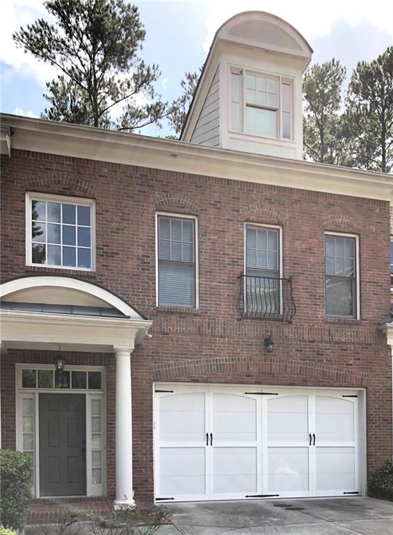 10575 Bent Tree View Duluth, GA 30097 - Photo 19 of 20 a front view of a house with a garage