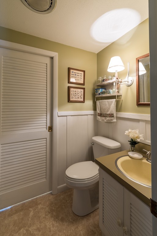 70 Stony Hill Road Amherst, MA 01002 - Photo 20 of 22 a bathroom with a toilet a sink and mirror