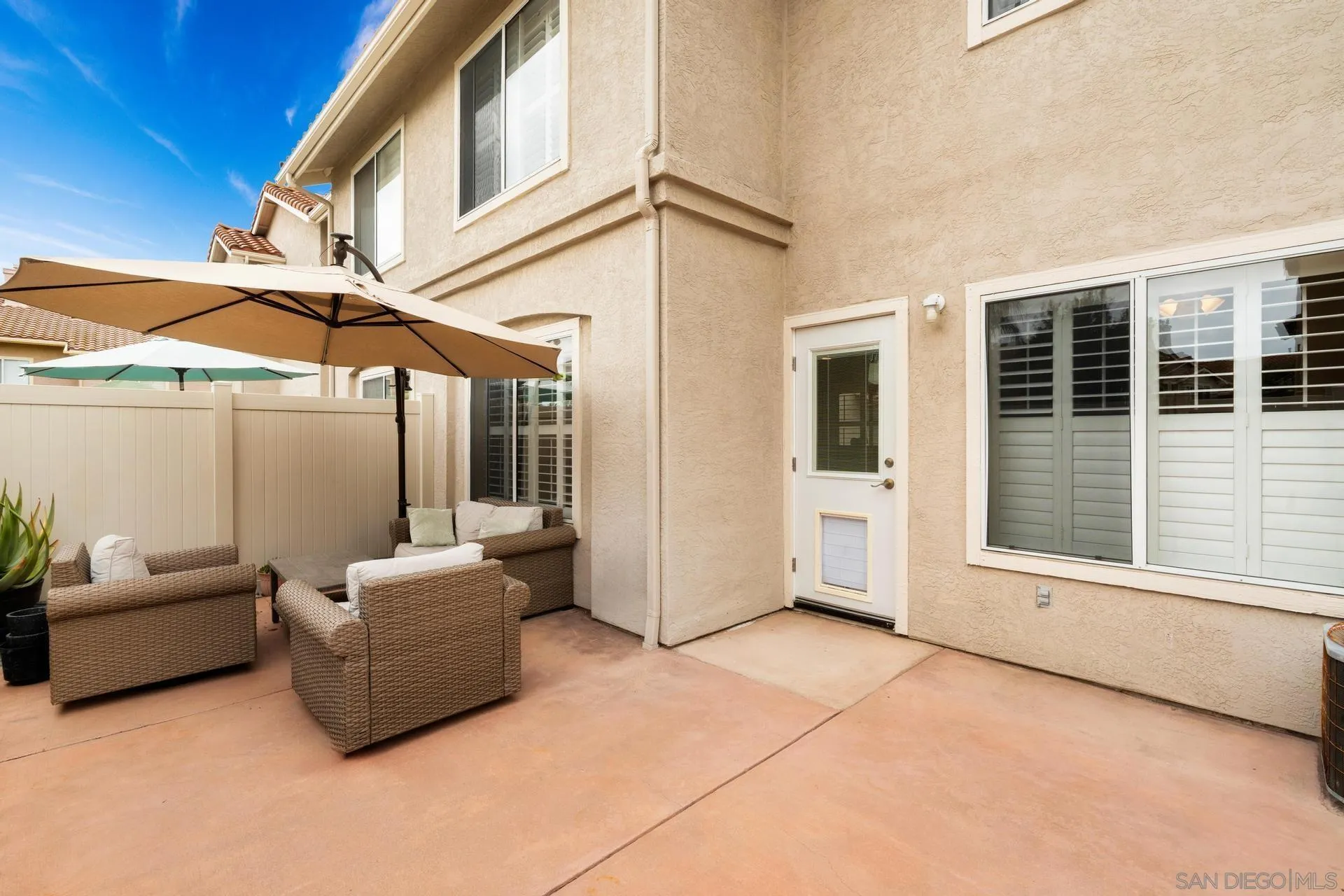405 Whispering Willow Drive, Unit C Santee, CA 92071 - Photo 32 of 39 a living room with furniture and a window
