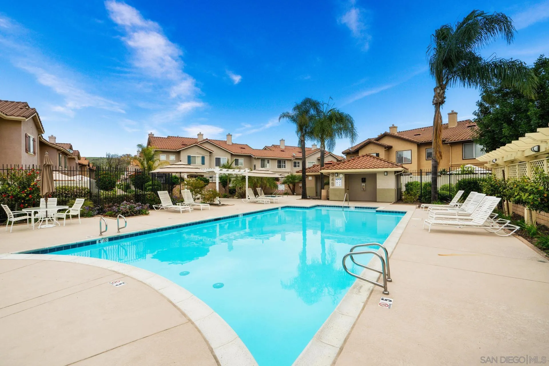 405 Whispering Willow Drive, Unit C Santee, CA 92071 - Photo 38 of 39 a view of a swimming pool with a patio