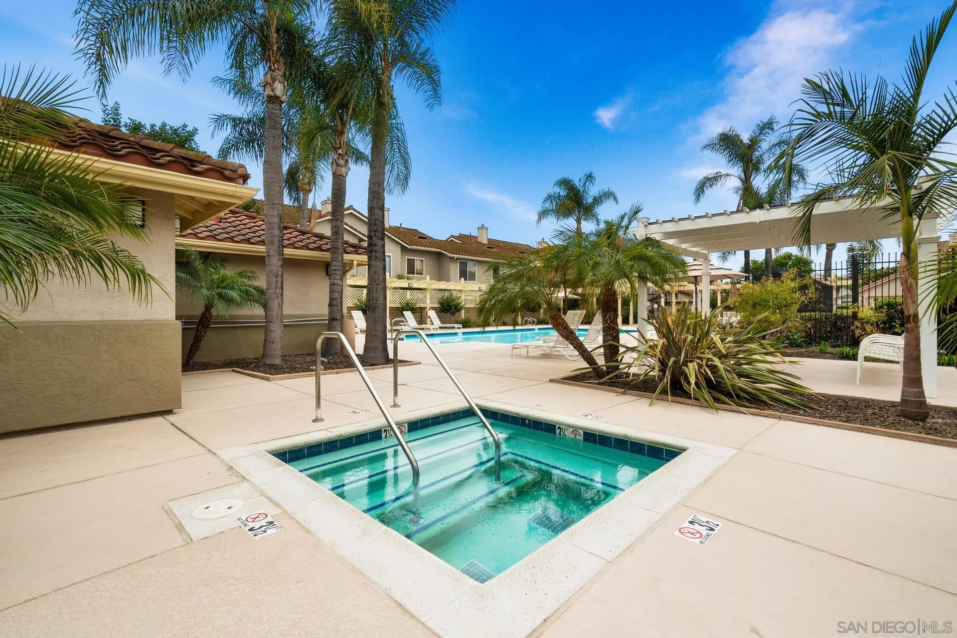 405 Whispering Willow Drive, Unit C Santee, CA 92071 - Photo 39 of 39 a swimming pool with outdoor seating and yard
