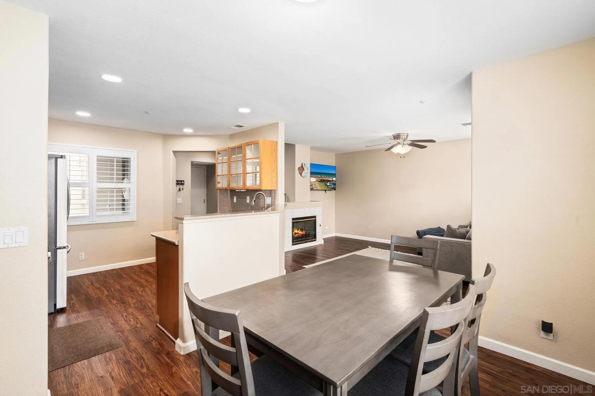 405 Whispering Willow Drive, Unit C Santee, CA 92071 - Photo 7 of 39 a kitchen with a table and chairs