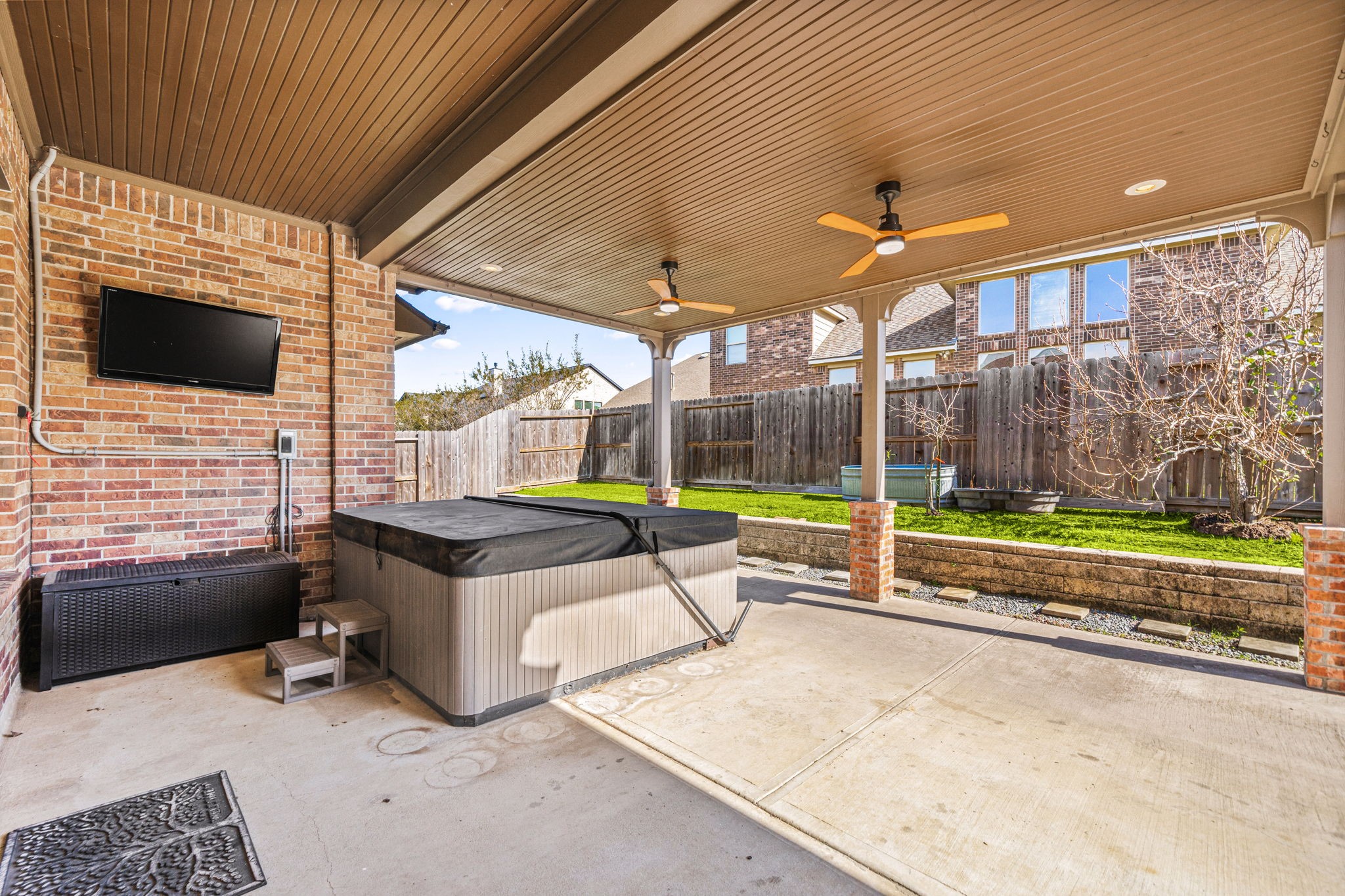 12514 Randy Riley Way Tomball, TX 77377 - Photo 31 of 44 a view of a swimming pool with a patio