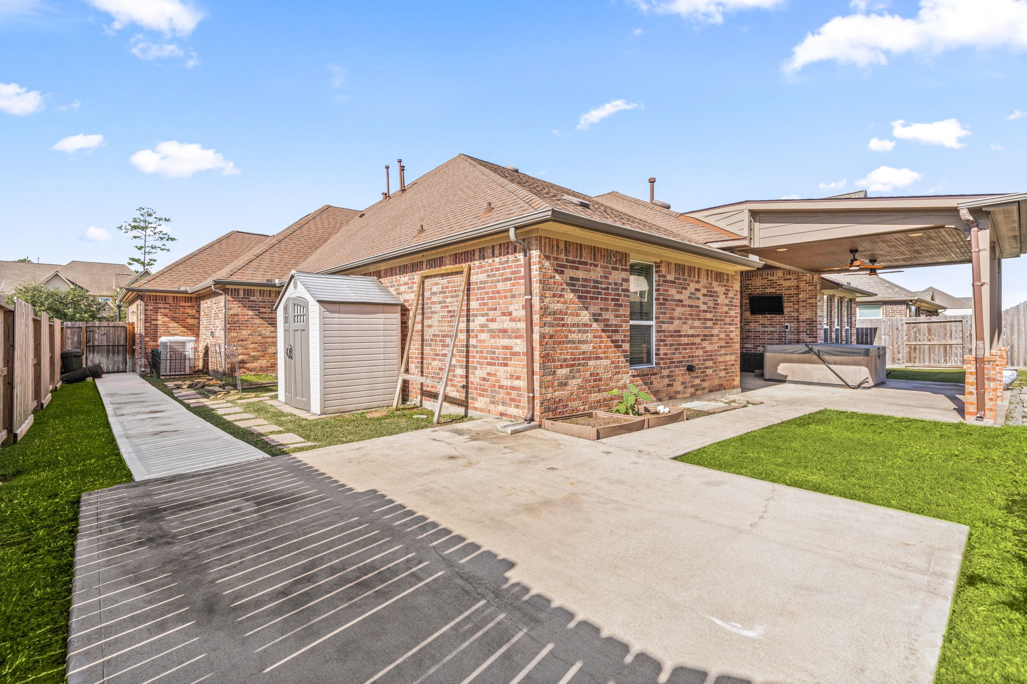 12514 Randy Riley Way Tomball, TX 77377 - Photo 34 of 44 a view of a house with a yard