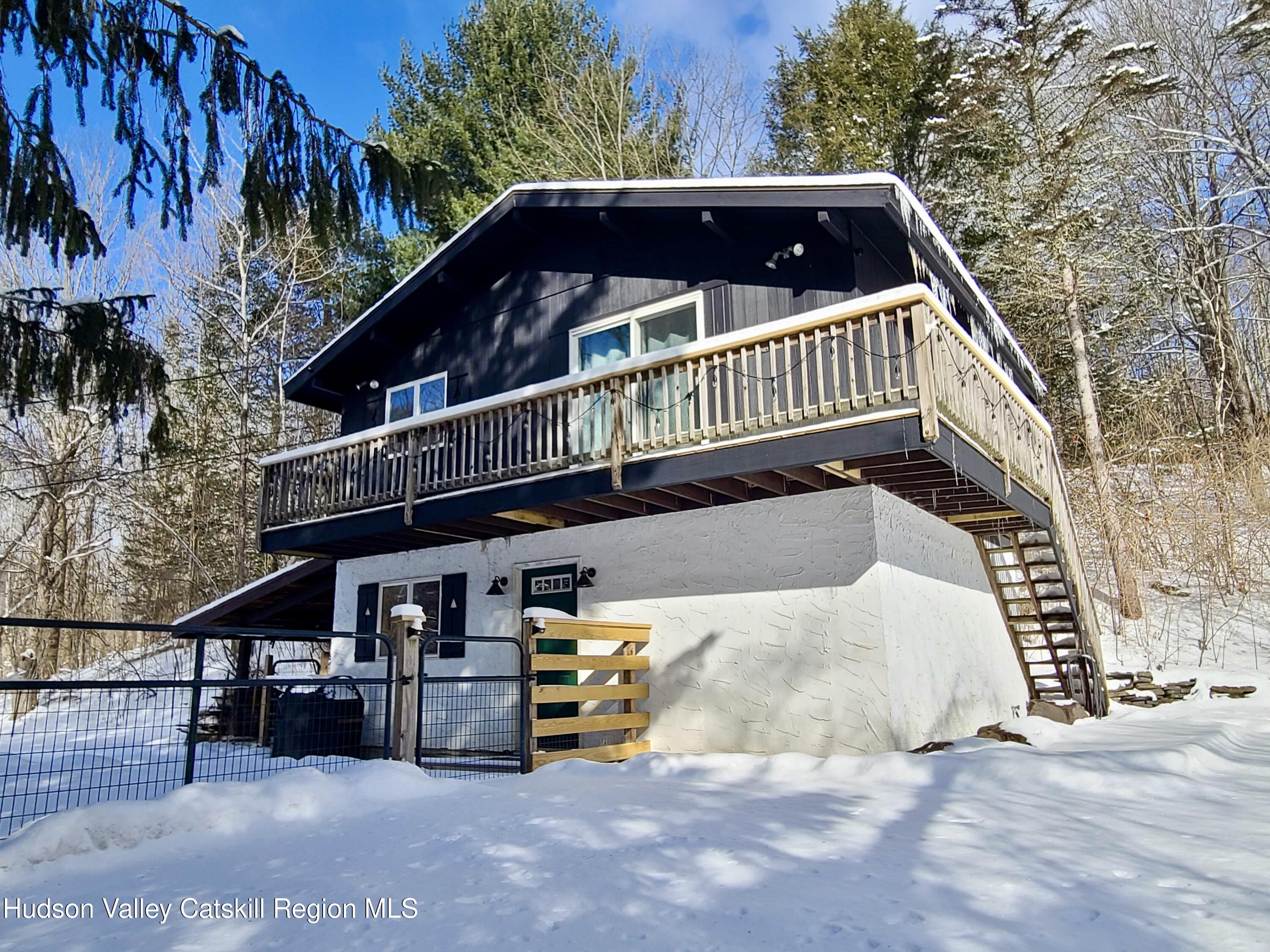11 Rose Mountain Road Pine Hill, NY 12465 - Photo 1 of 26 a front view of a house with a yard