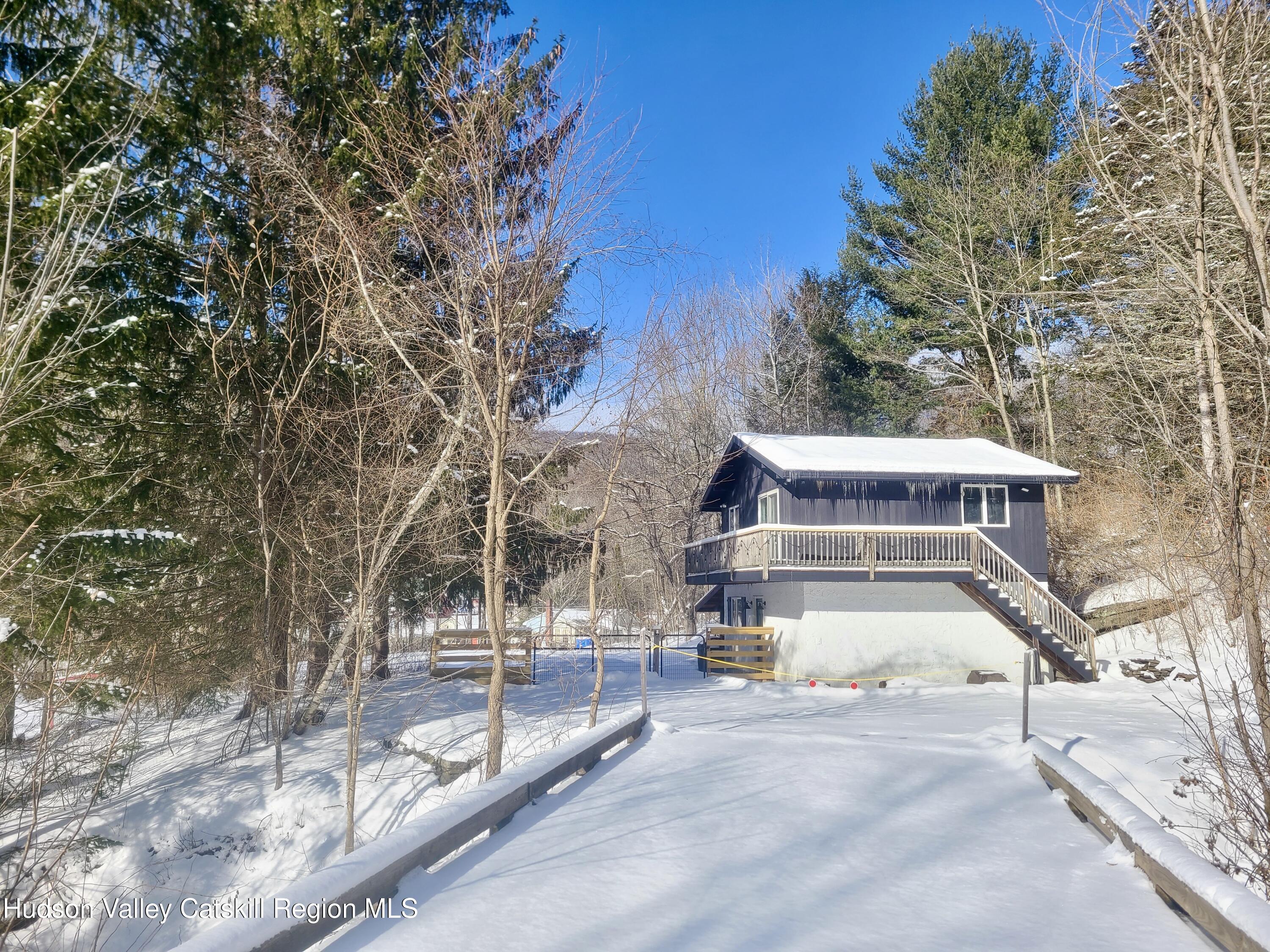 11 Rose Mountain Road Pine Hill, NY 12465 - Photo 2 of 26 a view of a large building with large trees