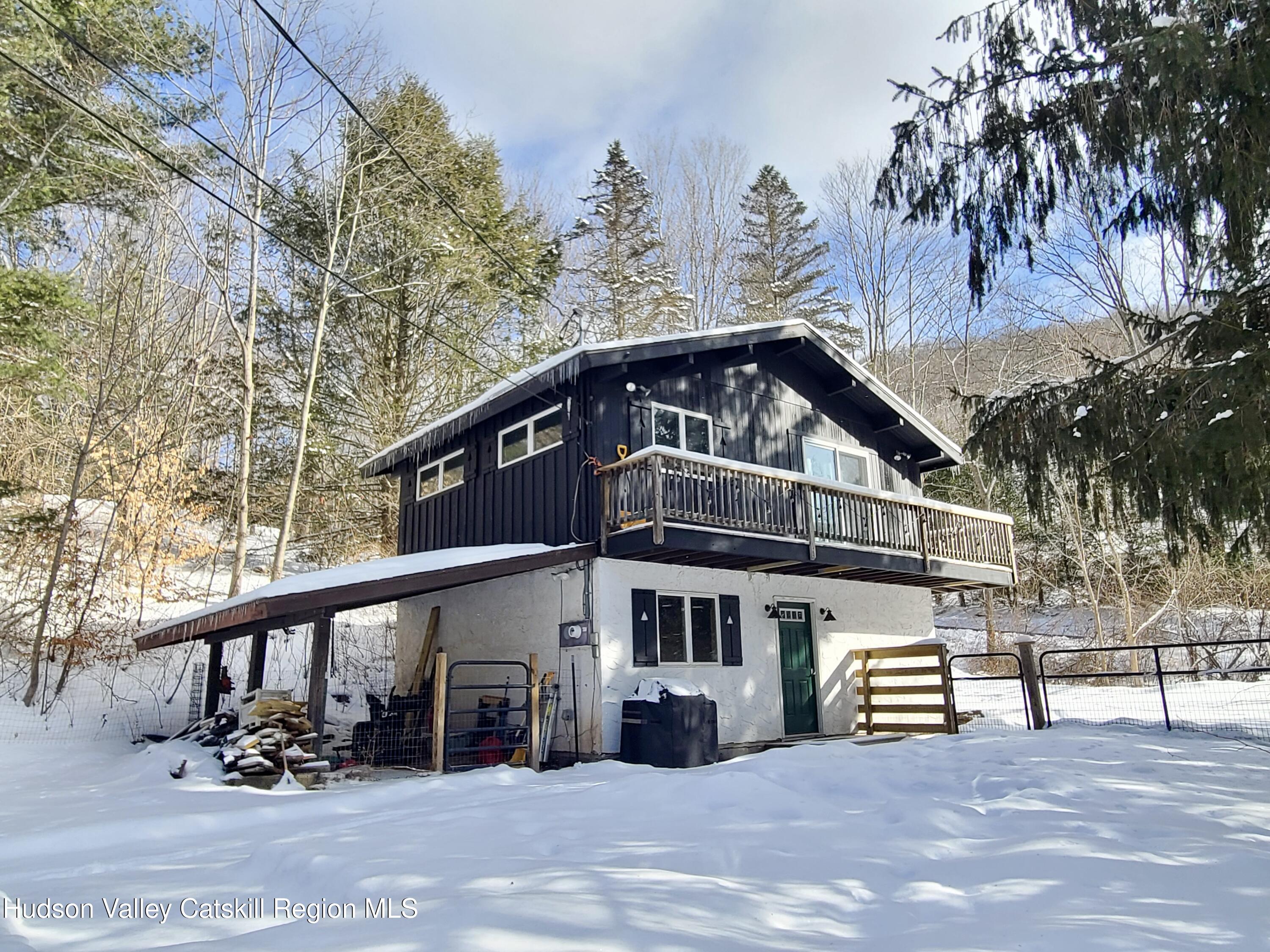 11 Rose Mountain Road Pine Hill, NY 12465 - Photo 22 of 26 a view of a house with large trees