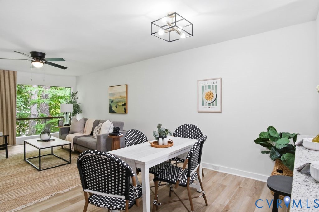 10270 Iron Mill Road Richmond, VA 23235 - Photo 13 of 29 Open-concept living and dining area with light woo