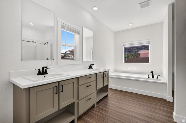 464 Jessop Avenue Hildale, UT 84784 - Photo 19 of 73 Dual vanity with matte black fixtures and ample storage cabinetry