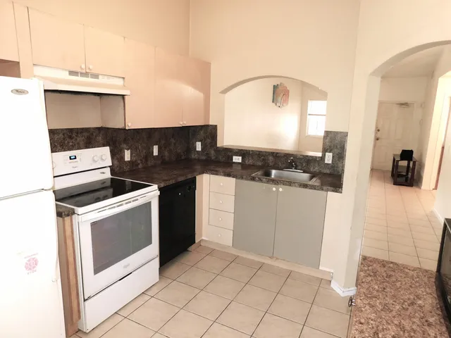 a room with furniture and a window