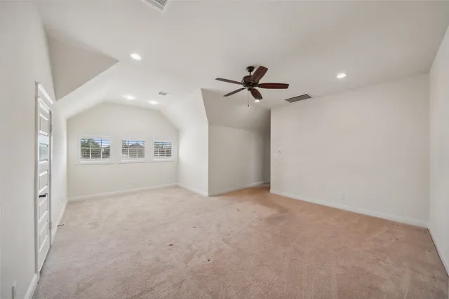a view of empty room with windows