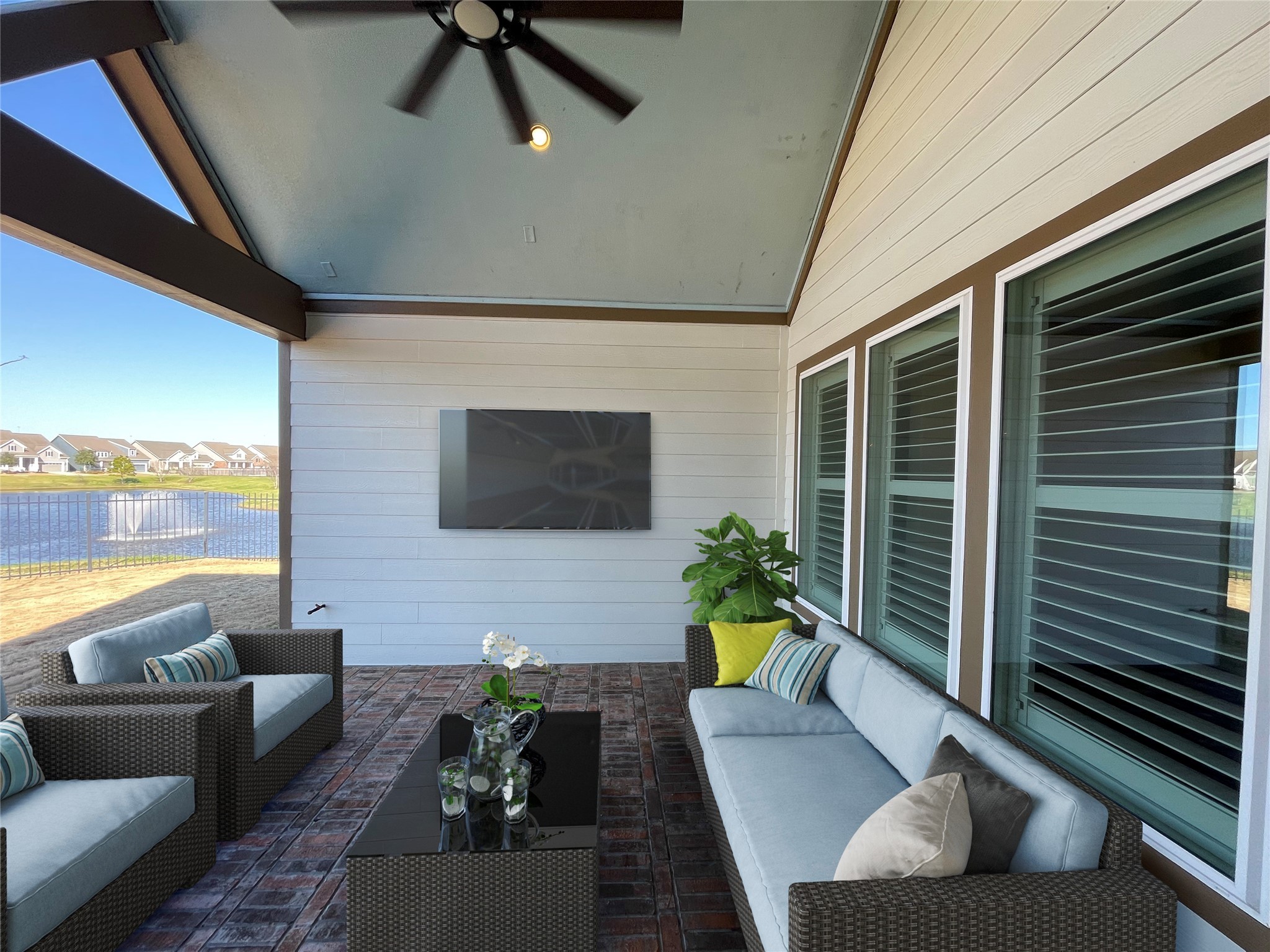 2149 Rope Maker Road Conroe, TX 77384 - Photo 26 of 45 a living room with furniture and a flat screen tv