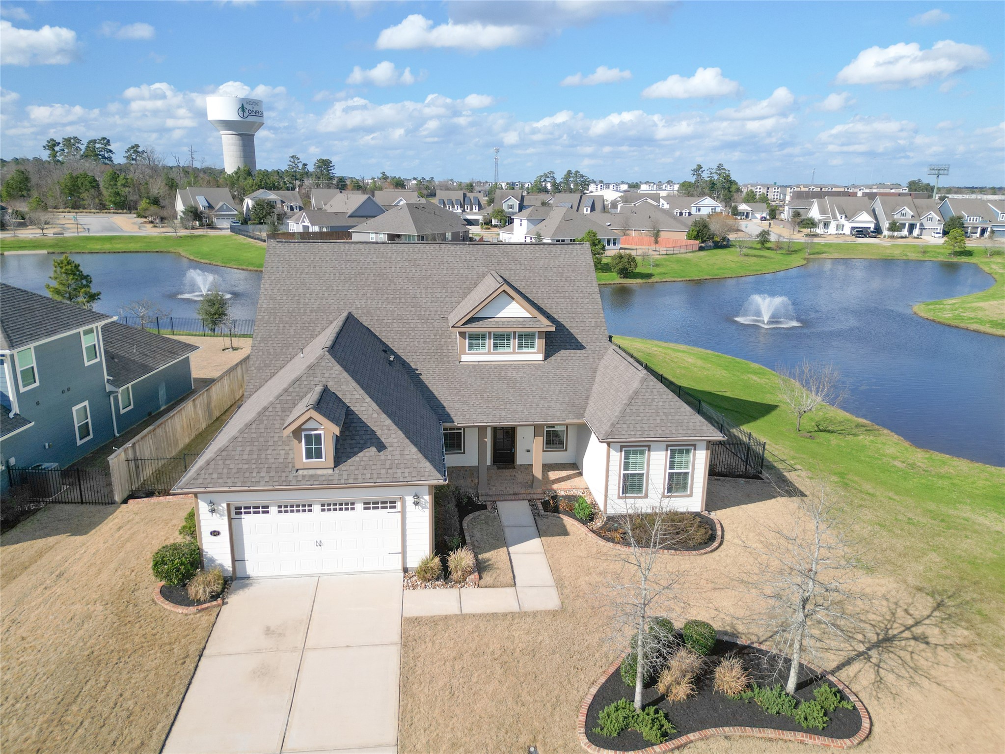 2149 Rope Maker Road Conroe, TX 77384 - Photo 29 of 45 an aerial view of a house with a lake view